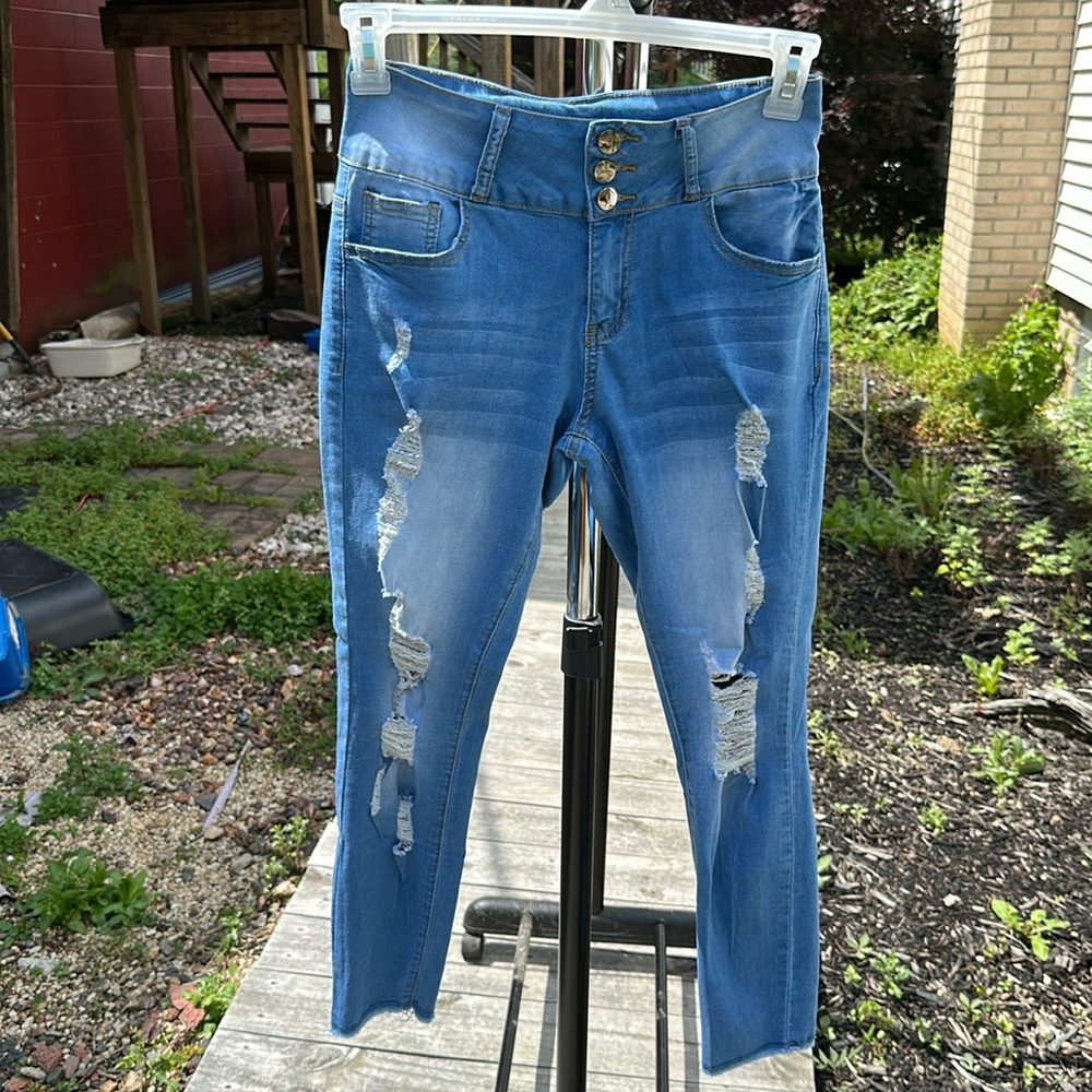 Stylish Blue Distressed Women Jeans. 26” inseam. 26” waist.